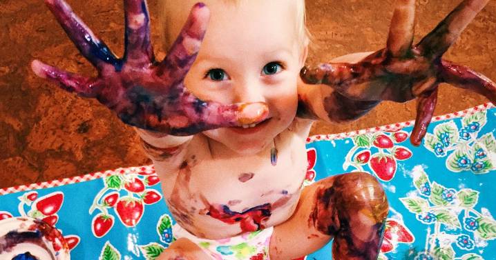 Parents in hysterics at family cat's reaction after toddler runs riot with paint