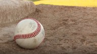 Off-duty officer, coach save teenager who collapsed on Indiana baseball field