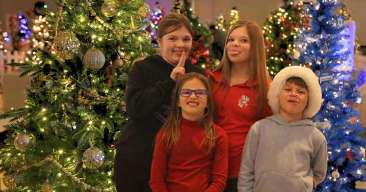 Families flock to see 71 beautifully decorated trees inside an iconic Milwaukee building