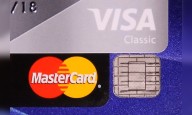 Visa and Mastercard reach agreement on merchant fee, end a 20