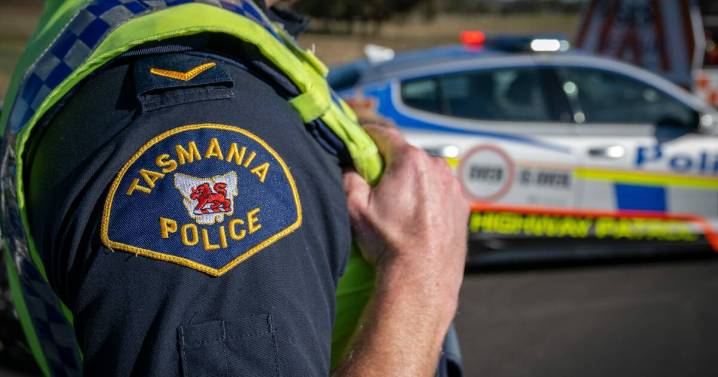 Woman arrested after car crash near CBD intersection