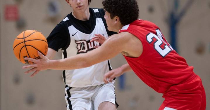 Dunn School wins season basketball opener 65