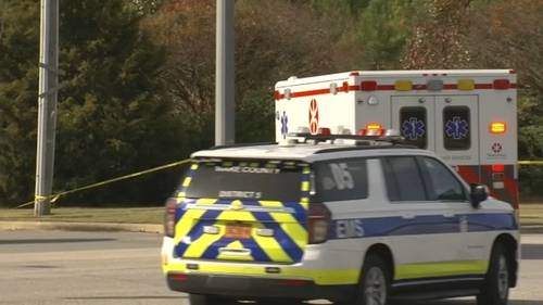 Friends remember 'very kind' WakeMed officer killed as questions remain about Garner shooting