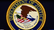 Court official dismisses Justice Department's misconduct complaint against a federal judge in DC