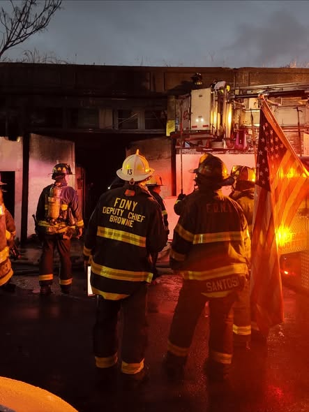 Civilian injured after two-alarm fire breaks out in Ozone Park auto body shop: FDNY