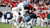 Wilson runs for 4 TDs as NC State beats UNC 42-19, winning rivalry game for 5th straight year