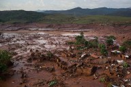 A decade after Brazil’s deadly dam collapse, Indigenous peoples demand justice on the eve of COP30