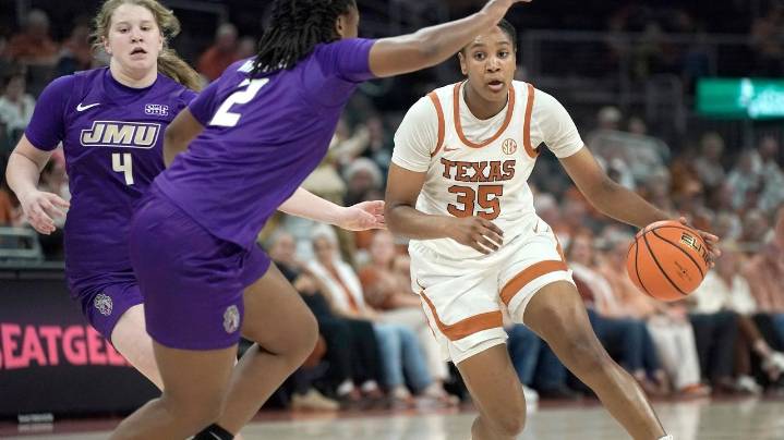 Booker's all-around performance leads No. 4 Texas to a 95