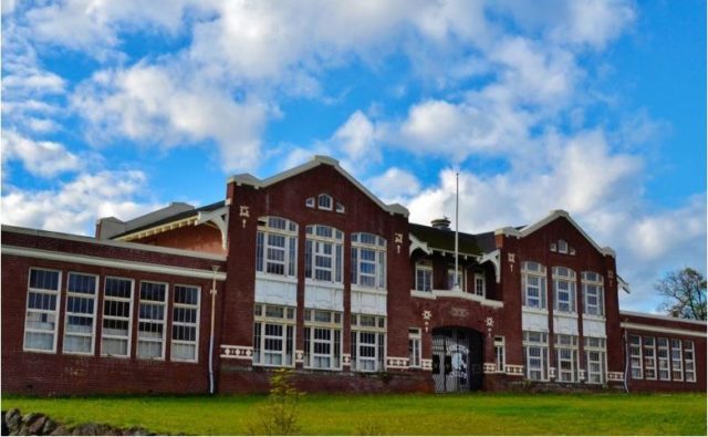 Lincoln School’s 1-acre north lawn is being listed for $600K