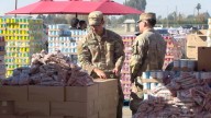 Thousands receive food bags during CAPK food distribution at Kern County Fairgrounds