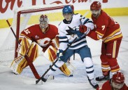 Wolf posts 16-save shutout, Calgary Flames blank San Jose Sharks 2