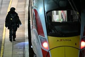 UK police probe mass train stabbing that wounded 10
