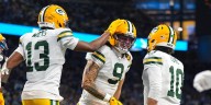 Love matches career high with 4 TD passes, lifting Packers to 31