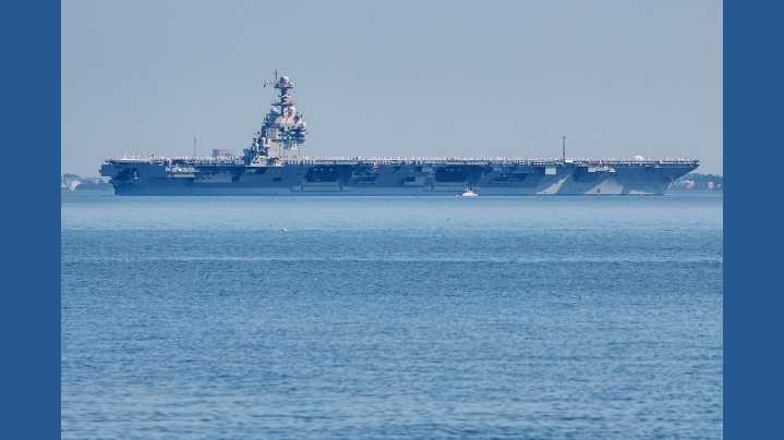 Trump says US may have discussions with Maduro as aircraft carrier arrives in Caribbean