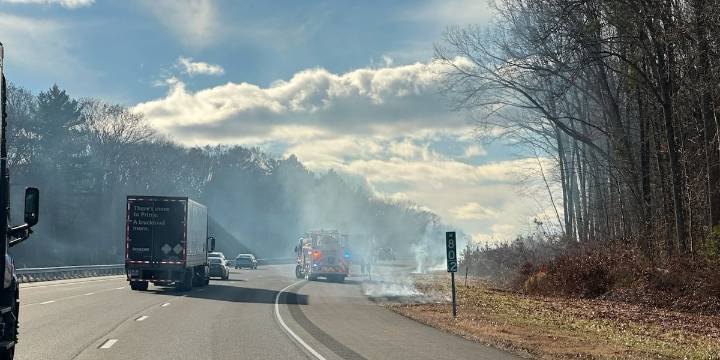 Crews respond to brush fire on I