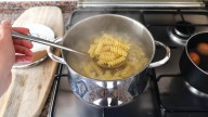 Why It's A Mistake To Cover The Pot While Cooking Pasta