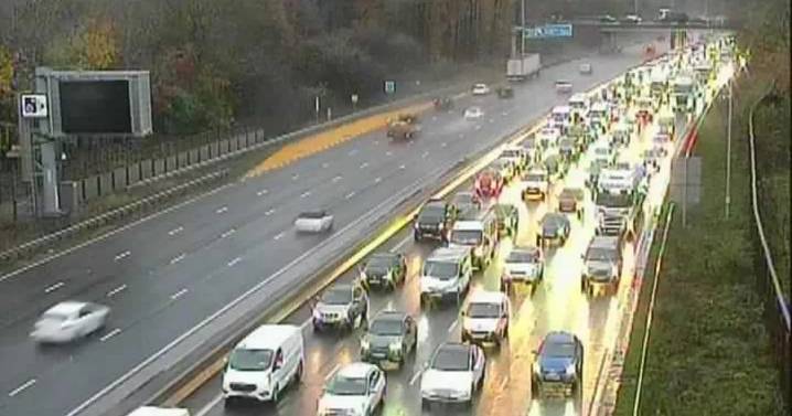 LIVE: Huge delays amid crash on Greater Manchester motorway as heavy rain hits region