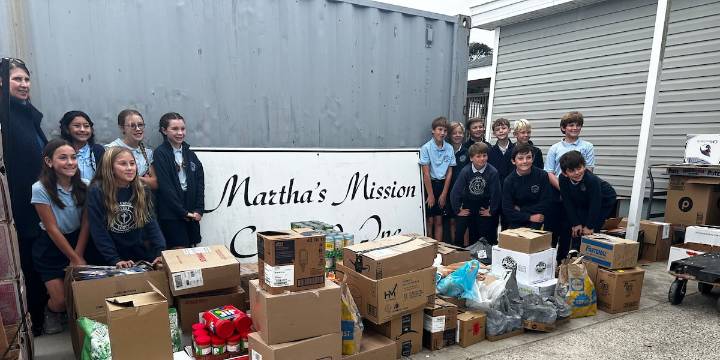 Carteret County students donate canned goods to the community