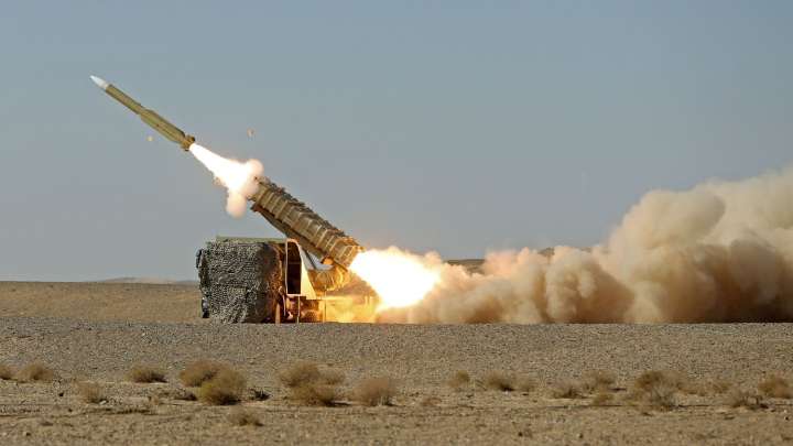 What are the consequences of an escalating global arms race?