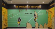 Travelers noticed an error in the Pittsburgh International Airport Franco Harris collage, now it's being fixed