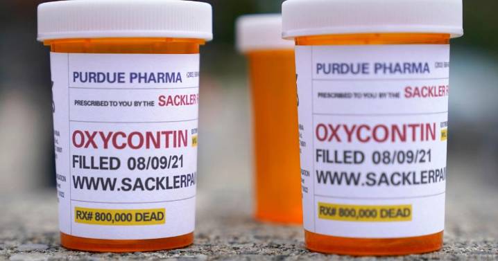 Judge approves opioid settlement for Purdue Pharma and Sackler family members who own the company