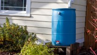 Ditch Industrial-Looking Rain Barrels For An Elegant Alternative With This Cool Diy
