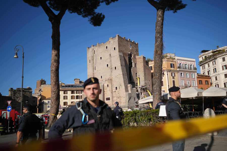 Rescuers race to save man trapped in partially collapsed medieval tower in Rome