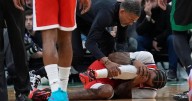 Clippers F Derrick Jones Jr. helped to locker room with apparent knee injury following a collision