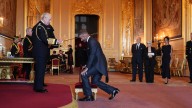 Bend a knee like David Beckham: Football star knighted by King Charles III