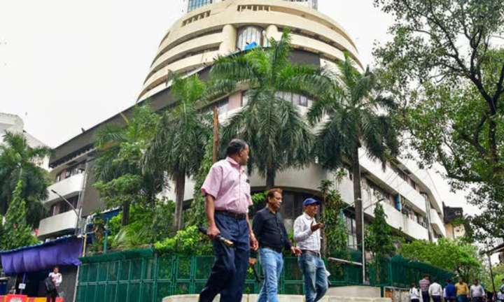 Sensex, Nifty open marginally down amid negative global cues