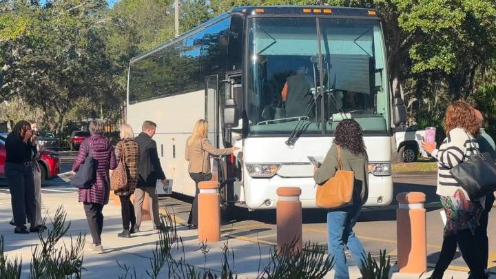 Bus tour highlights transformation in University area