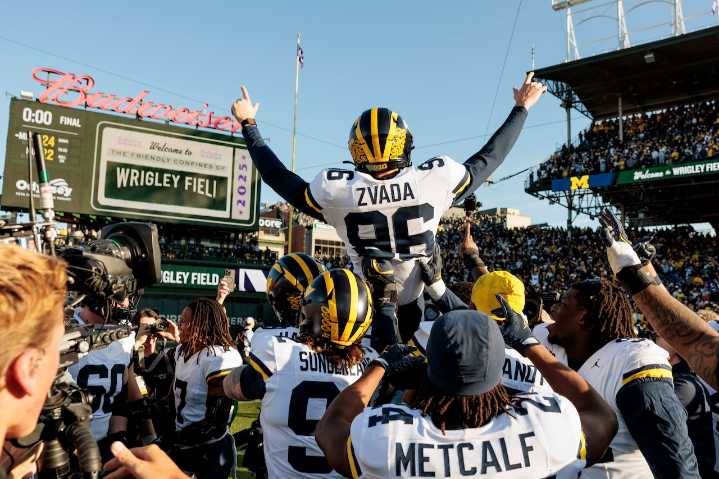See photos as field goal lifts Michigan over Northwestern at Wrigley Field
