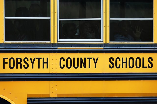 Forsyth County school bus struck by driver who fell asleep at the wheel, authorities said