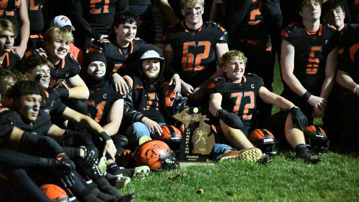 Photos: Almont football defeats Detroit Edison to win regional title