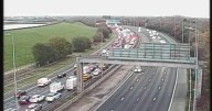 M60 LIVE: All traffic STOPPED on motorway after vehicle overturns in crash