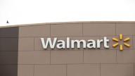 Walmart lifts outlook as online gains overcome economic woes
