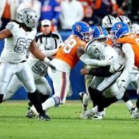 NFL-best Broncos edge Raiders to win seventh in a row