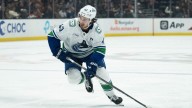 Canucks’ Quinn Hughes returns to practice after missing four games