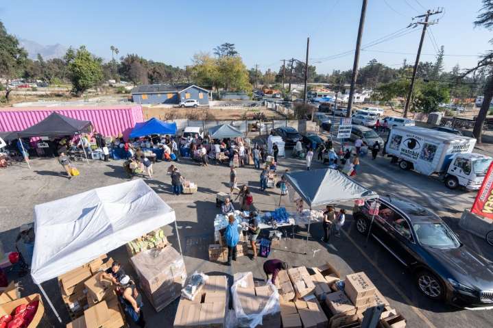 Photos: Altadena food-and-essentials distribution draws hundreds to Fair Oaks Burger site