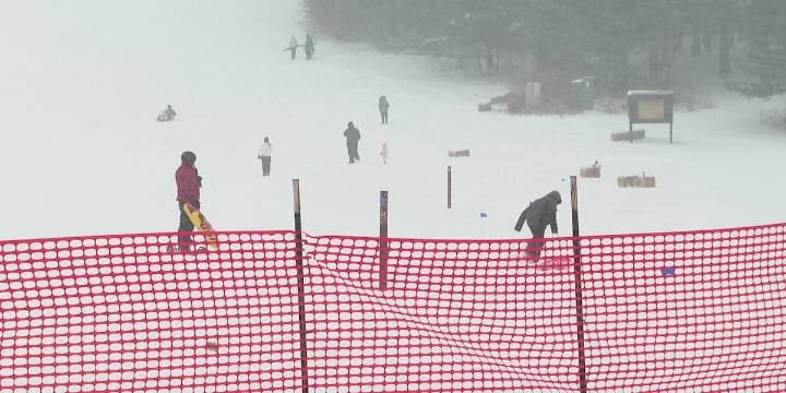 Families flock to Elver Park after first heavy snowfall