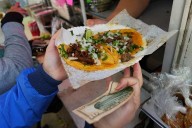 'A day without fear': Chicagoans buy out street vendors amid immigration crackdown