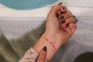 Ukrainians turn to tattoos to ease grief from war