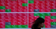 Stocks slip as markets eye US data barrage