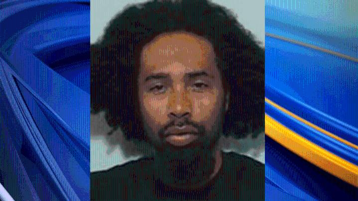 Police search for man accused of shooting at downtown Albuquerque barber shop