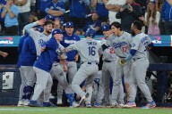 Baseball-Dodgers cement MLB dynasty with back