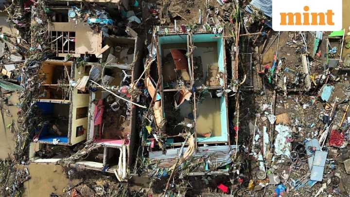 Homes washed away, cars toppled as typhoon leaves trail of ruin in Philippines