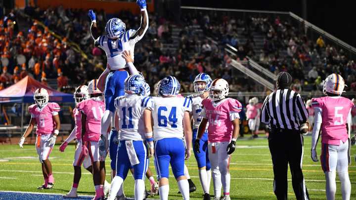 Which 3 Monroe County Region football teams won district titles?