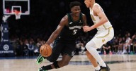 Edwards caps 39-point performance with unlikely 3 as Timberwolves hold off Celtics 119