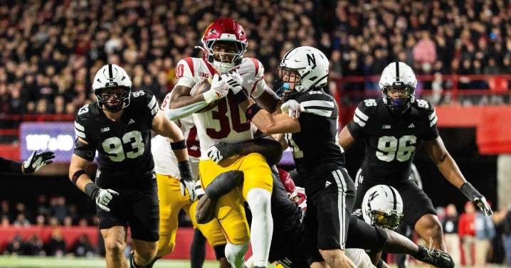 No. 23 USC uses late surge to win at Nebraska and keep playoff hopes alive