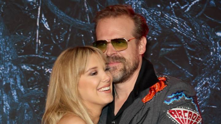 Millie Bobby Brown dazzles in lace gown as she and David Harbour reunite on Stranger Things red carpet